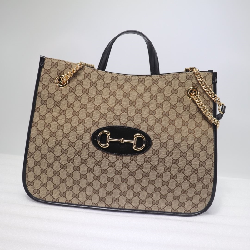 G*u*i shopping bags